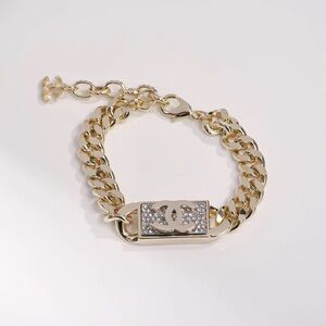 Gold Bracelet with Silver Accents